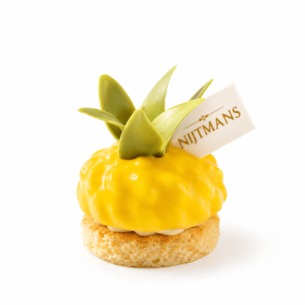 Gele ananaspatisserie met gouden detail